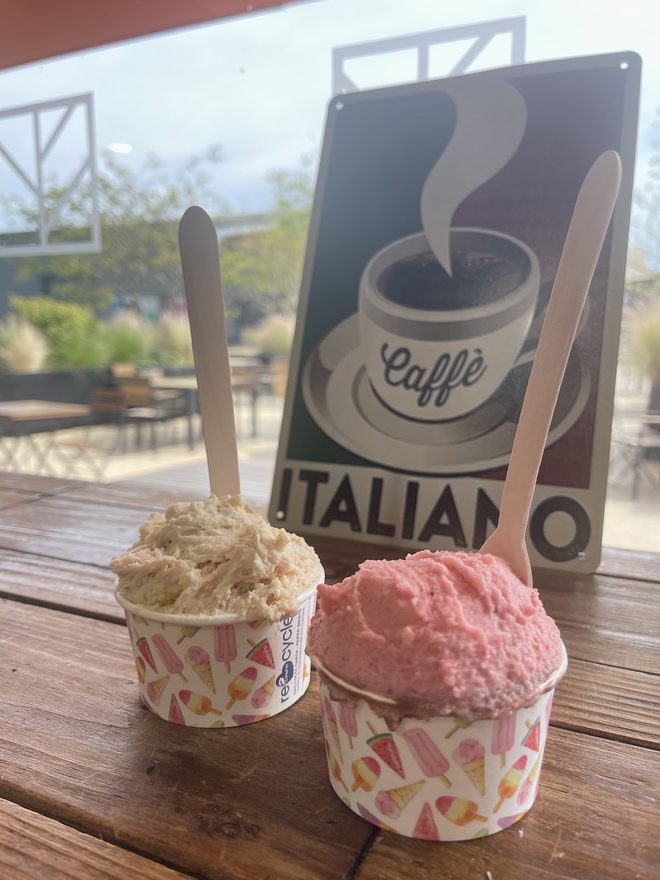 Gelato in two tubs on an outdoor table