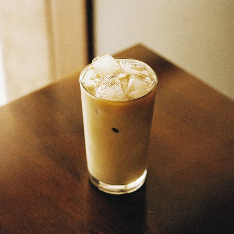 An iced latte in a tall glass